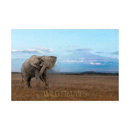 The mighty tusker stands proud, with Kilimanjaro’s beauty in the background-canvas