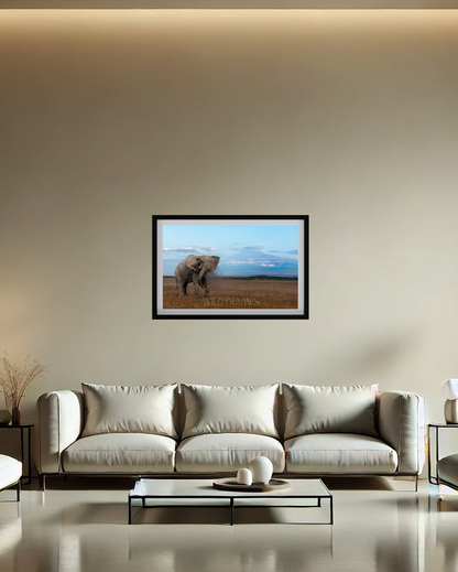 The mighty tusker stands proud, with Kilimanjaro’s beauty in the background-premium paper