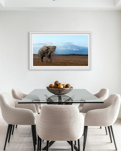 The mighty tusker stands in Kilimanjaro’s beauty -premium paper